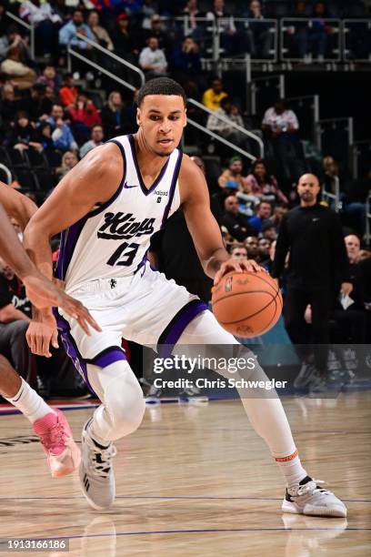 Keegan Murray of the Sacramento Kings dribbles the ball during the game against the Detroit Pistons on January 9, 2024 at Little Caesars Arena in...