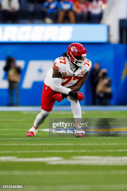 Lucas Niang of the Kansas City Chiefs in an offensive stance during a game against the Los Angeles Chargers at SoFi Stadium on January 7, 2024 in...