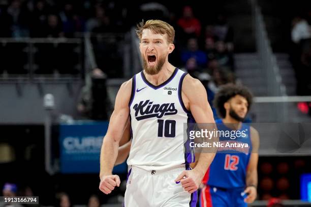 Domantas Sabonis of the Sacramento Kings celebrates against the Detroit Pistons during the third quarter at Little Caesars Arena on January 09, 2024...