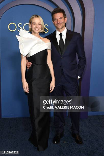 English actress Carey Mulligan and US actor and director Bradley Cooper arrive for the Academy of Motion Picture Arts and Sciences' 14th Annual...