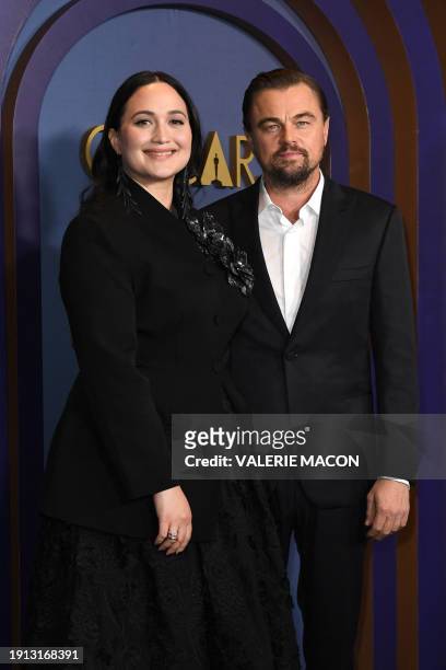 Actress Lily Gladstone and US actor Leonardo DiCaprio arrive for the Academy of Motion Picture Arts and Sciences' 14th Annual Governors Awards at the...