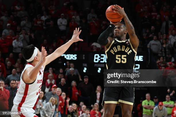 Lance Jones of the Purdue Boilermakers shoots over Keisei Tominaga of the Nebraska Cornhuskers in the second half at Pinnacle Bank Arena on January...