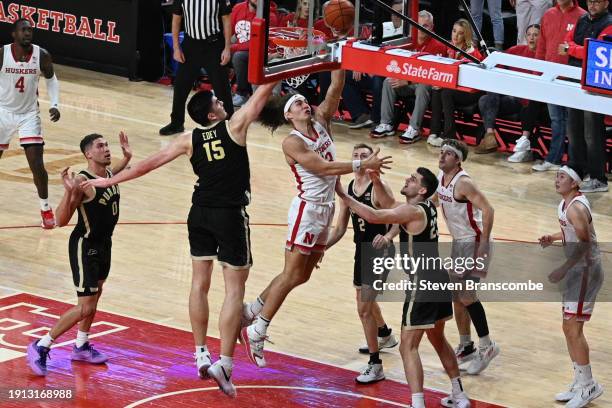 Josiah Allick of the Nebraska Cornhuskers scores against Zach Edey of the Purdue Boilermakers in the second half at Pinnacle Bank Arena on January 9,...