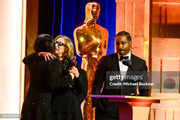 Michelle Satter accepts the Jean Hersholt Humanitarian Award onstage with Chloé Zhao and Ryan Coogler at the 14th Governors Awards held at The Ray...