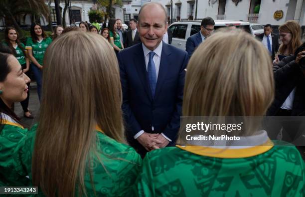 Micheal Martin, Ireland's Deputy Prime Minister and Minister of Foreign Affairs and Defence, is greeting women during his visit to the Museo del...