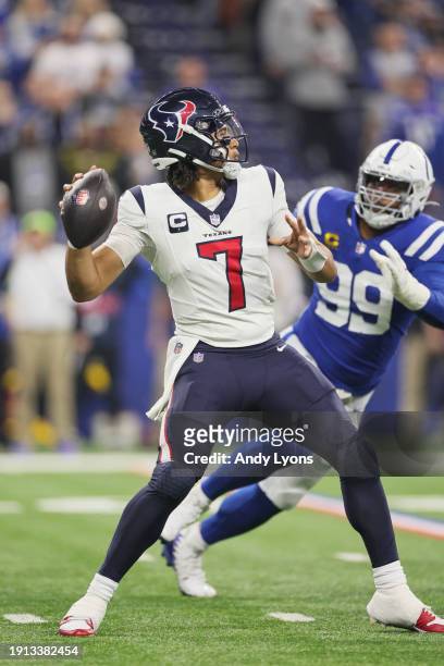 Stroud of the Houston Texans throws a touchdown pass during the first quarter against the Indianapolis Colts at Lucas Oil Stadium on January 06, 2024...
