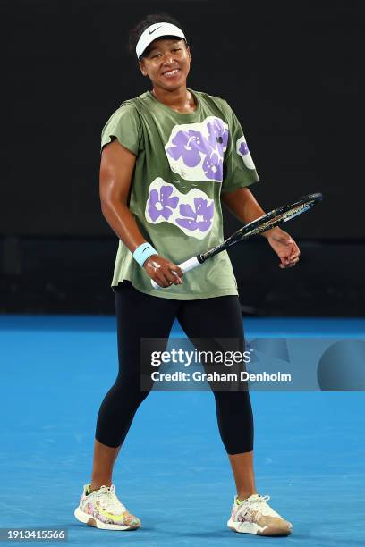 Naomi Osaka of Japan smiles during a training session ahead of the 2024 Australian Open at Melbourne Park on January 07, 2024 in Melbourne, Australia.