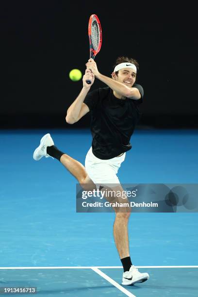 Taylor Fritz of the United States plays a backhand during a training session ahead of the 2024 Australian Open at Melbourne Park on January 07, 2024...