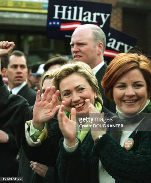 First Lady Hillary Rodham Clinton waves to the crowd during a St. Patrick's Day parade in the Sunnyside neighborhood of Queens, New York, 05 March...