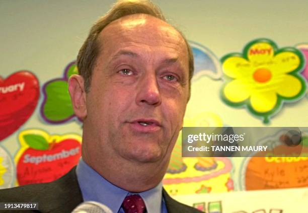 Democratic presidential hopeful Bill Bradley blinks back tears after listening to a mother tell how her child apologized for getting sick and having...