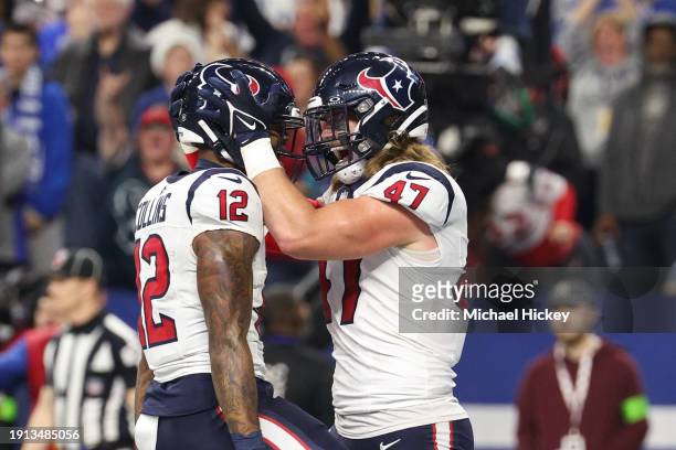 Nico Collins of the Houston Texans celebrates a touchdown with Andrew Beck of the Houston Texans during the second quarter against the Indianapolis...