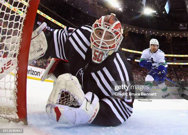 Nico Daws of the New Jersey Devils tends net against the Vancouver Canucks at Prudential Center on January 06, 2024 in Newark, New Jersey. The...