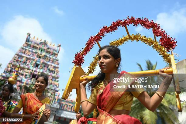 Students perform traditional dance as they take part in Pongal celebrations, the Tamil harvest festival, at a college in Chennai on January 10, 2024.