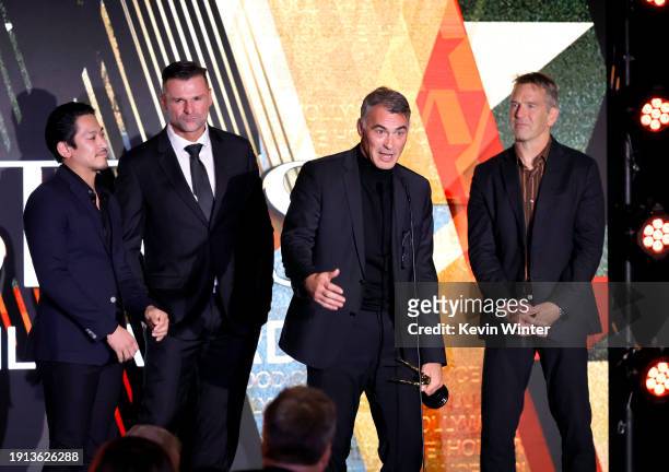 Jeremy Marinas, Stephen Dunlevy, Chad Stahelski and Scott Rogers accept the Spotlight Award onstage during the 2024 Astra Film Awards at Biltmore Los...
