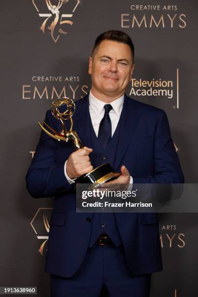 Nick Offerman poses with the Outstanding Guest Actor in a Drama Series award during the 2024 Creative Arts Emmys at Peacock Theater on January 06,...