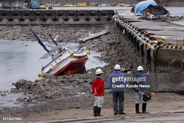 Photo taken on Jan. 10 shows a portion of the seabed at a fishing port in Wajima, Ishikawa Prefecture, that became visible after being elevated due...