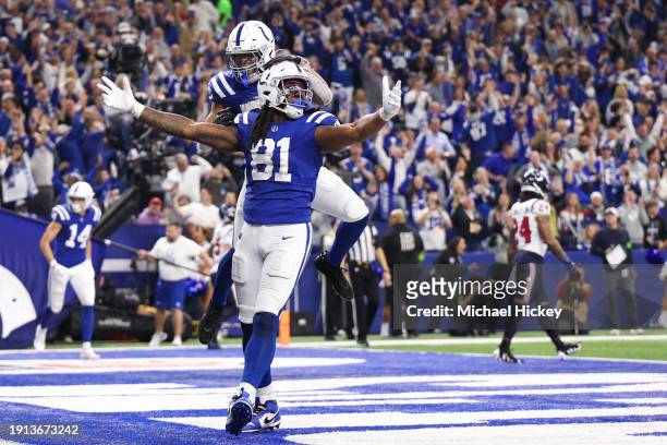 Mo Alie-Cox of the Indianapolis Colts celebrates during the fourth quarter against the Houston Texans at Lucas Oil Stadium on January 06, 2024 in...