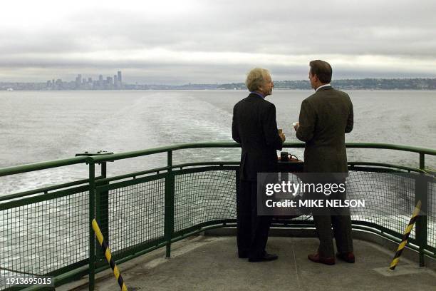 Democratic presidential candidate US Vice President Al Gore and his running mate US Senator Joe Lieberman have a cup of coffee as they take the...