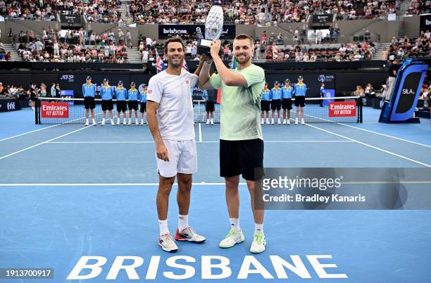 Lloyd Glasspool of Great Britain and Jean-Julien Rojer of the Netherlands celebrate victory after the Men’s Doubles Final match against Tim Puetz of...