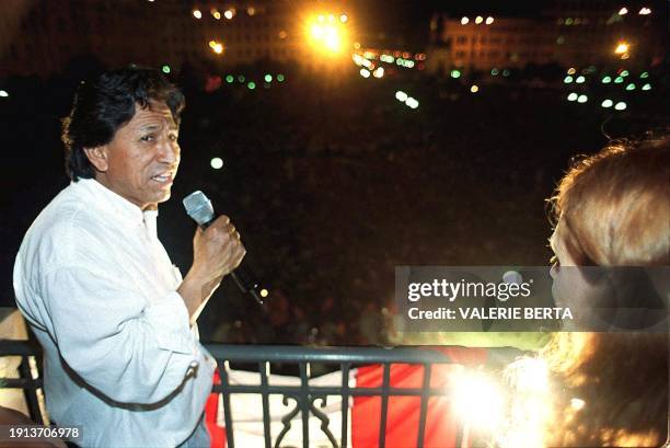 Peruvian opposition presidential candidate Alejandro Toledo looks at his wife Eliane Karp during a speech directed to his supporters in Plaza San...