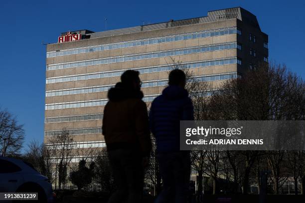 Photograph taken on January 10, 2024 shows the logo of the Japanese multinational information and communications technology equipment and services...