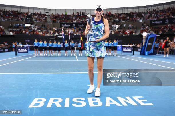 Elena Rybakina of Kazakhstan poses with the trophy after winning her final match against Aryna Sabalenka of Belarus during day eight of the 2024...