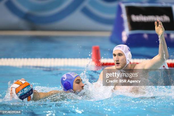 Nikola Rajlic of Slovenia and Jorn Muller of Netherlands during the 2024 Men's European Water Polo Championship match Netherlands v Slovenia at the...