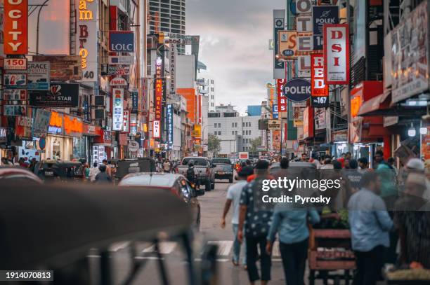 crowds and businesses on the streets of colombo, sri lanka. - colombo stock pictures, royalty-free photos & images