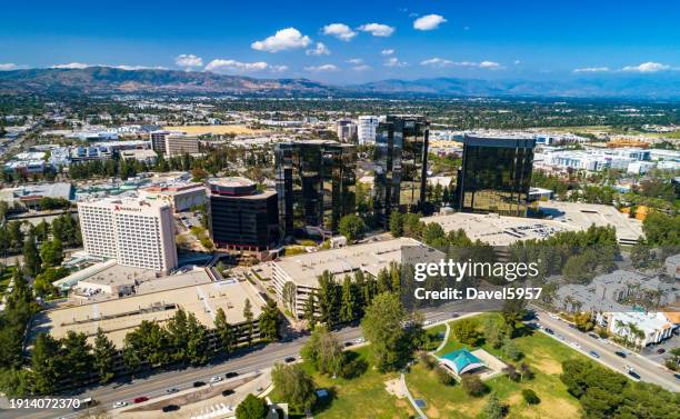 woodland hills / warner center aerial with mountains, puffy clouds - woodland hills stock pictures, royalty-free photos & images