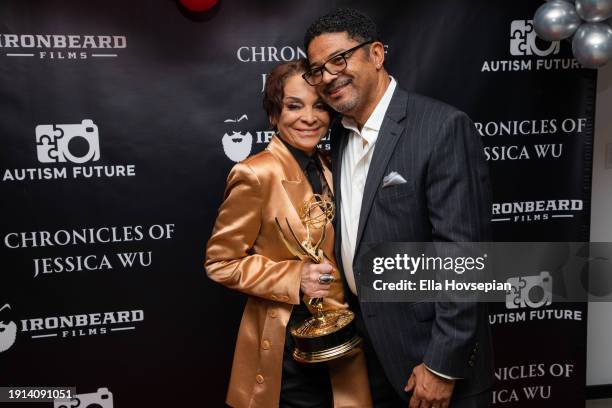 Jasmine Guy and guest pose on the red carpet celebrating her Emmy win at The Bixby + Barlow Building on January 06, 2024 in Los Angeles, California.