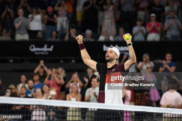 Grigor Dimitrov of Bulgaria celebrates match point in his final match against Holger Rune of Denmark during day eight of the 2024 Brisbane...