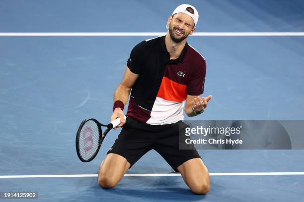 Grigor Dimitrov of Bulgaria celebrates match point in his final match against Holger Rune of Denmark during day eight of the 2024 Brisbane...