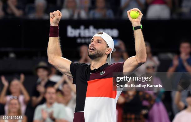 Grigor Dimitrov of Bulgaria celebrates victory after the Men’s Final match against Holger Rune of Denmark during day eight of the 2024 Brisbane...
