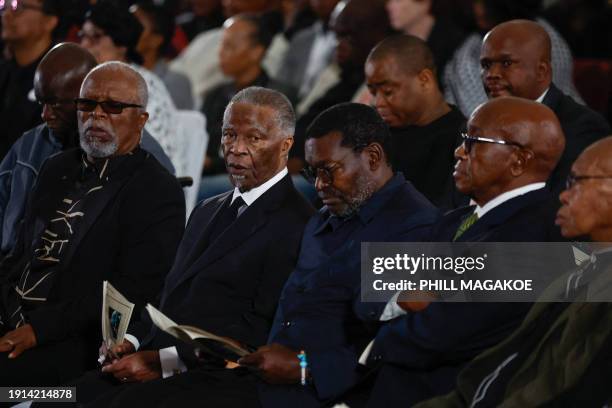 South African actor, author, director and playwright John Kani and Former President of South Africa Thabo Mbeki attend the funeral service of Peter...