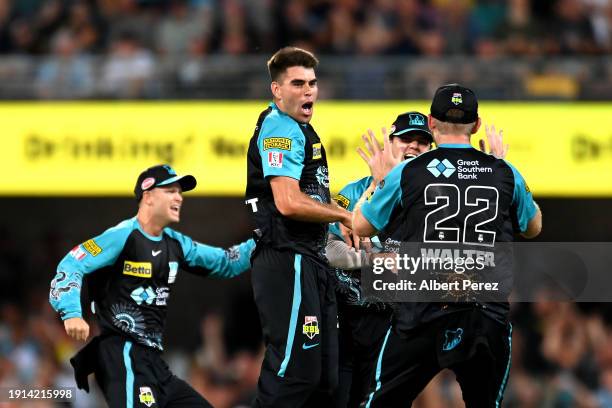 Xavier Bartlett of the Heat celebrates a wicket during the BBL match between Brisbane Heat and Hobart Hurricanes at The Gabba, on January 07 in...