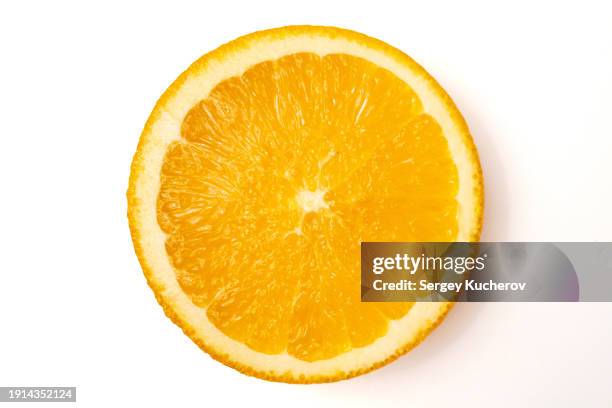 orange slice on a white background - laranja imagens e fotografias de stock