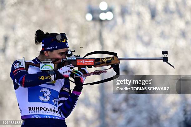 France's Julia Simon zeros her rifle at the shooting range prior to the women's 4x6km relay event of the IBU Biathlon World Cup in Ruhpolding,...