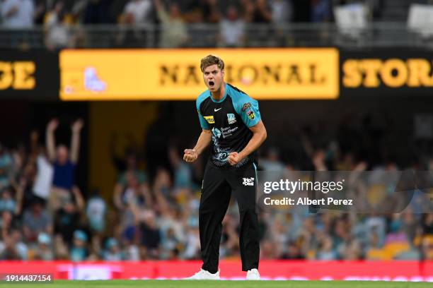 Spencer Johnson of the Heat celebrates a wicket during the BBL match between Brisbane Heat and Hobart Hurricanes at The Gabba, on January 07 in...