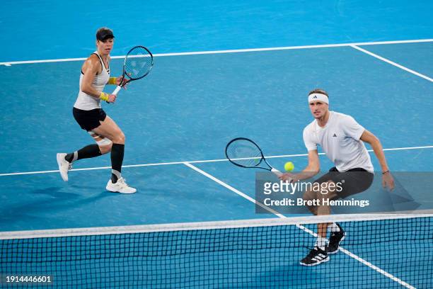 Alexander Zverev of Germany and Laura Siegemund of Germany compete in their finals match against Hubert Hurkacz of Poland and Iga Swiatek of Poland...