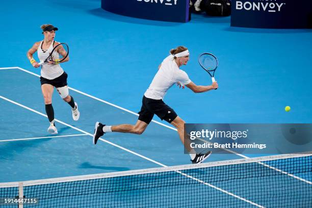 Alexander Zverev of Germany and Laura Siegemund of Germany compete in their finals match against Hubert Hurkacz of Poland and Iga Swiatek of Poland...