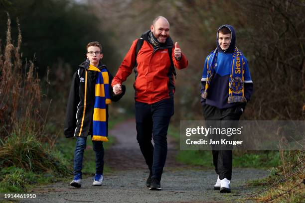 Shrewsbury Town fans arrive at the stadium prior to the Emirates FA Cup Third Round match between Shrewsbury Town and Wrexham at New Meadow on...