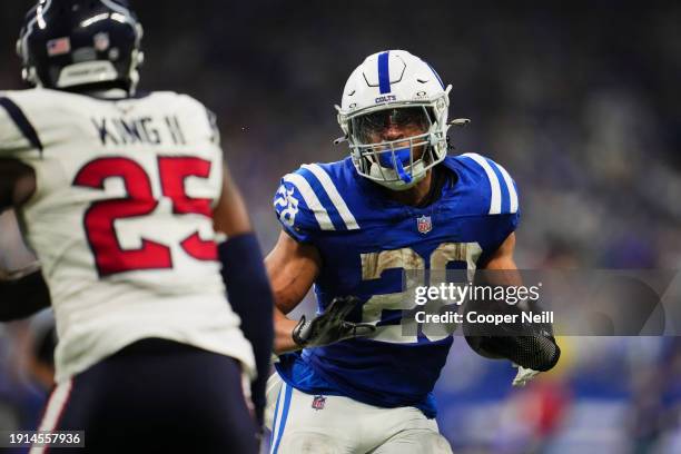 Jonathan Taylor of the Indianapolis Colts carries the ball against the Houston Texans at Lucas Oil Stadium on January 6, 2024 in Indianapolis,...