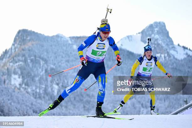 Ukraine's Yuliia Dzhima competes during the women's 4x6km relay event of the IBU Biathlon World Cup in Ruhpolding, southern Germany on January 10,...