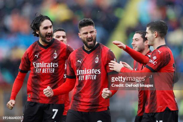 Olivier Giroud of AC Milan celebrates after scoring his team's second goal with team mates during the Serie A TIM match between Empoli FC and AC...