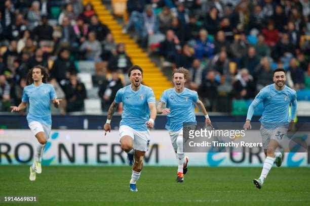Luca Pellegrini of Lazio celebrates scoring a goal with teammates during the Serie A TIM match between Udinese Calcio and SS Lazio at Bluenergy...