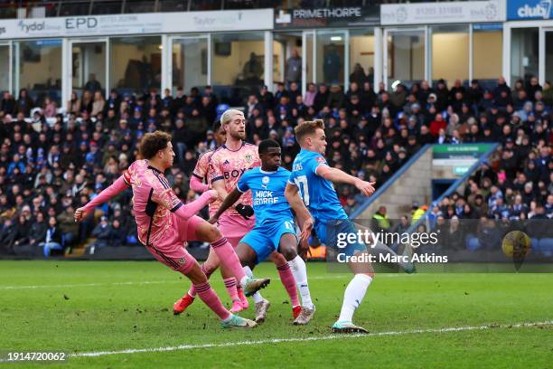 Ethan Ampadu of Leeds United scores his team's first goal during the Emirates FA Cup Third Round match between Peterborough United and Leeds United...