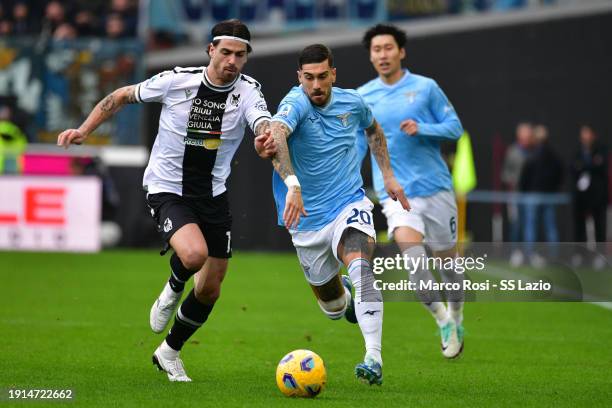 Mattia Zaccagni of SS Lazio competes for the ball with Joao Ferreira of Udinesa Calcio during the Serie A TIM match between Udinese Calcio and SS...