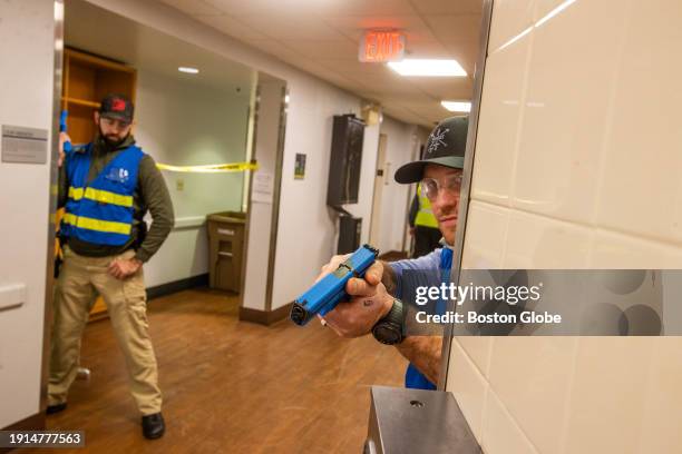 Wellesley, MA Police react to a simulated hostage situation during an active shooter training session.