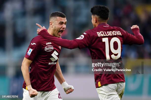 Alessandro Buongiorno of Torino FC celebrates scoring his team's third goal with teammate Raoul Bellanova during the Serie A TIM match between Torino...