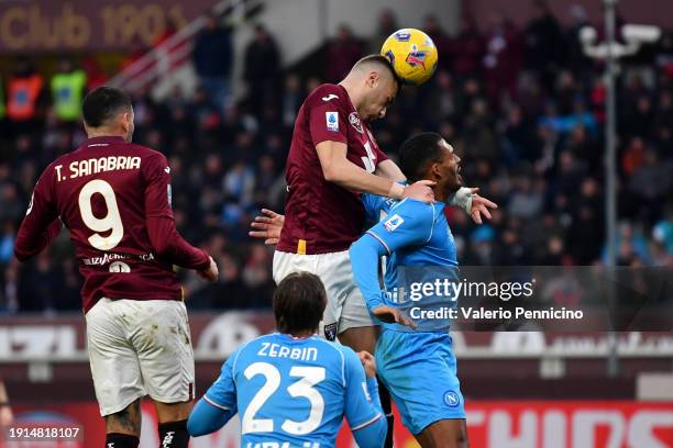 Alessandro Buongiorno of Torino FC scores his team's third goal during the Serie A TIM match between Torino FC and SSC Napoli at Stadio Olimpico di...